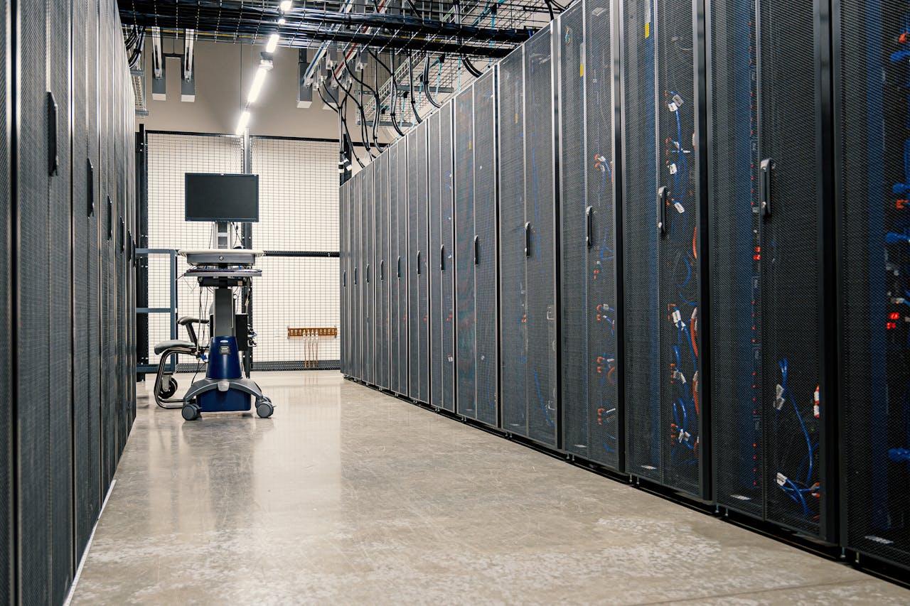 Modern data center corridor with server racks and computer equipment. Ideal for technology and IT concepts.